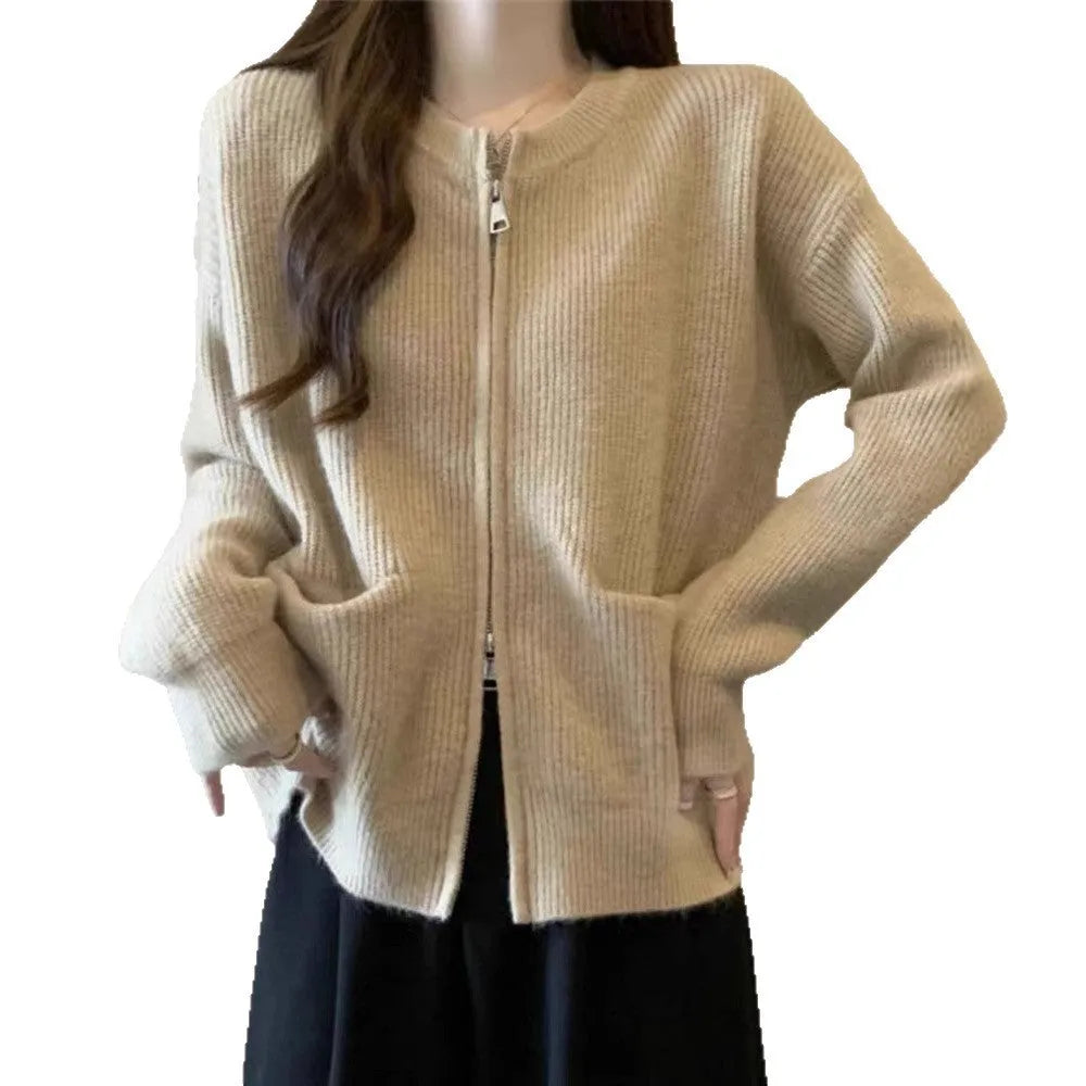 Beige viscose fibre long sleeve sweater coat cardigan laid flat.