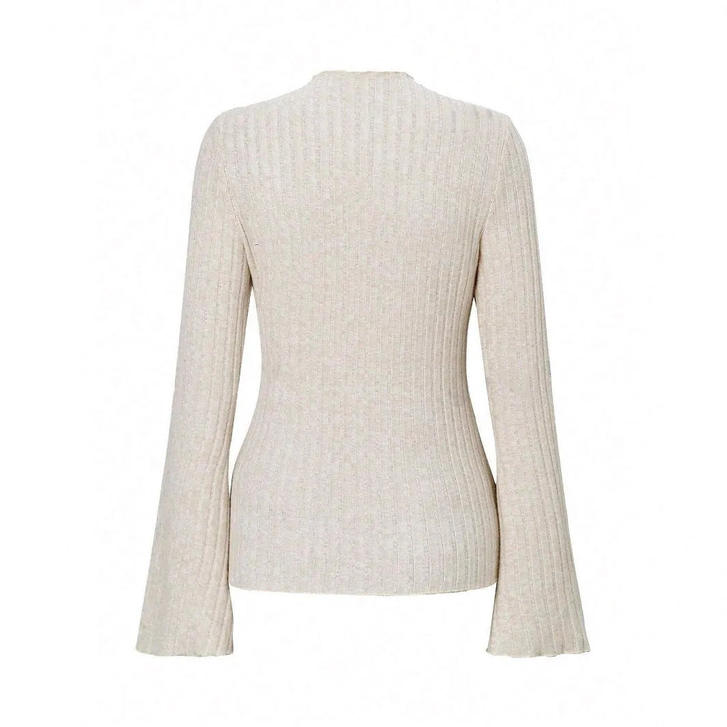 Long sleeve slim fit top with lantern sleeves in black brushed polyester fabric.