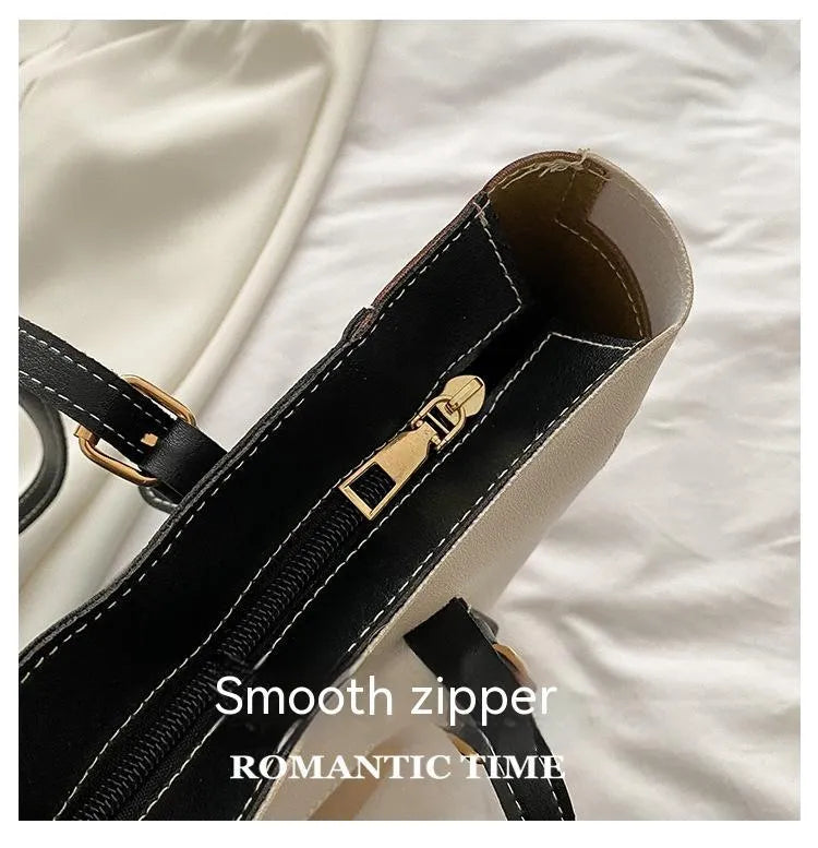 Large capacity women's PU tote bag with contrast stitching, available in khaki, green, blue, pink, and gray, featuring a phone pocket.
