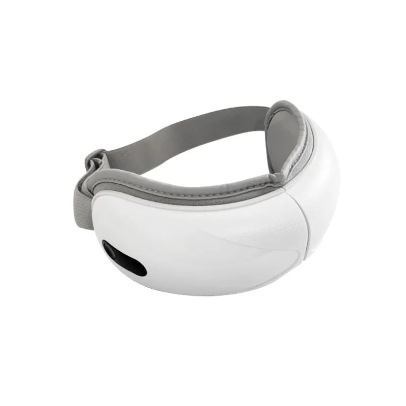 White rechargeable airbag eye massager with heat compression on a plain background