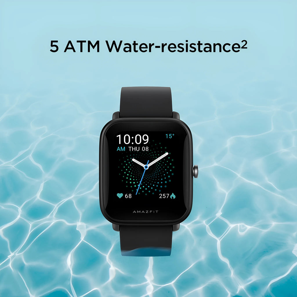 Smart watch with colour screen and green silicone strap on wrist, showing fitness data.