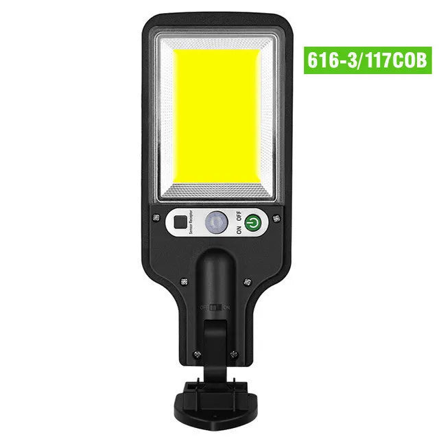 Outdoor solar LED wall lamp with 5.5V 2.5W solar panel, 227x84x40mm, white housing, mounted on a brick wall