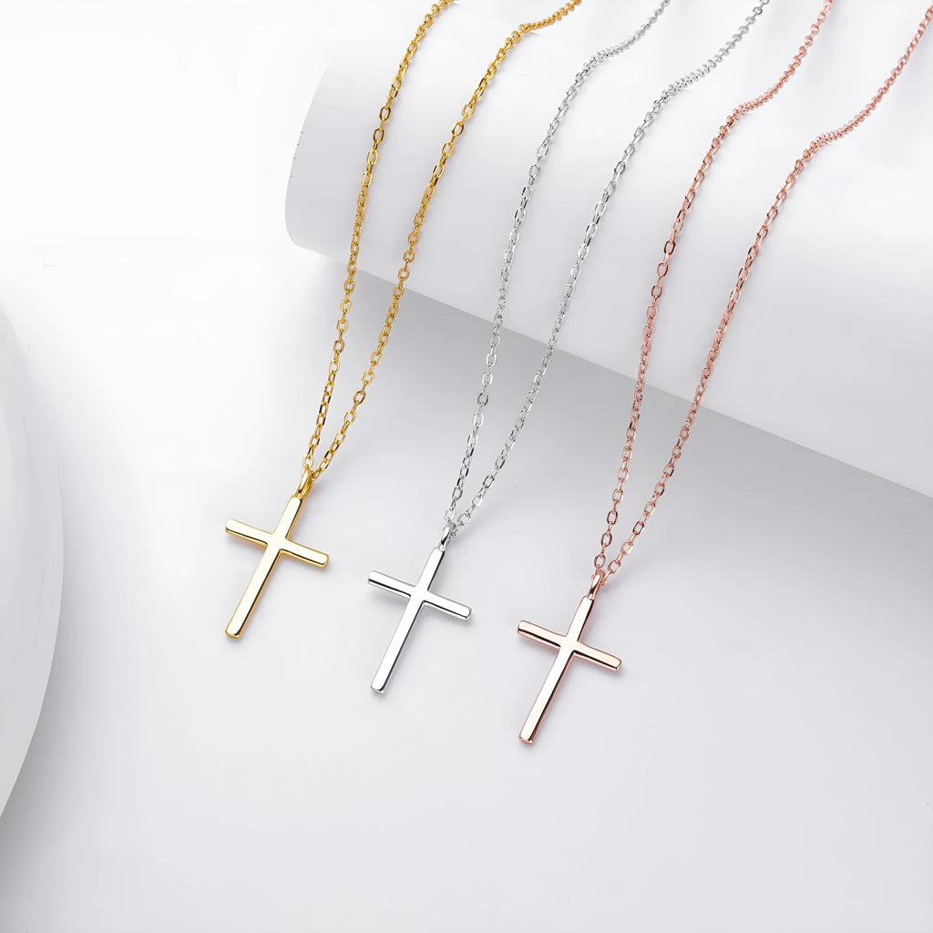S925 sterling silver necklace with a simple glossy cross pendant on an O-shaped clavicle chain.