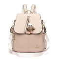 Genuine leather travel backpack with pendant in beige colour for female students, featuring belt decoration and splicing details
