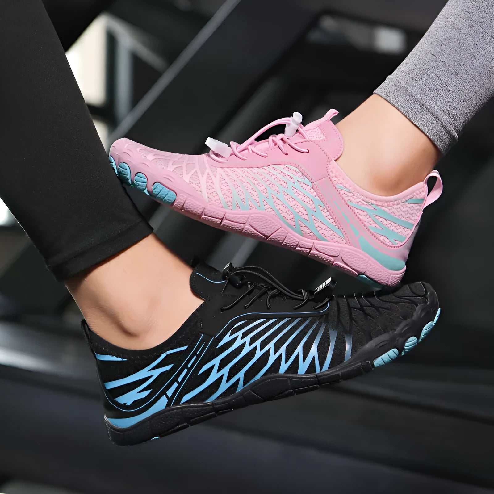 Low-top white outdoor sports shoes with lace-up front and textured rubber sole.