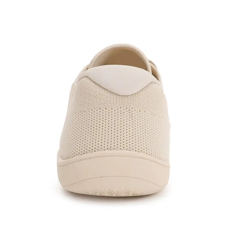 Wide toe barefoot yoga shoes with rubber sole and cotton lining in black, side view