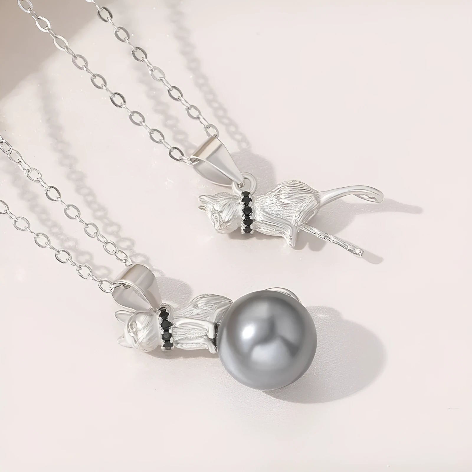 925 sterling silver cat pendant clavicle necklace with electroplated finish showing feline silhouette design