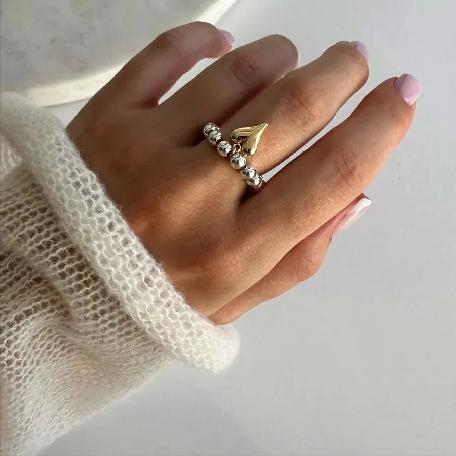 Handmade beaded elastic ring with geometric love heart design in gold or silver electroplated finish