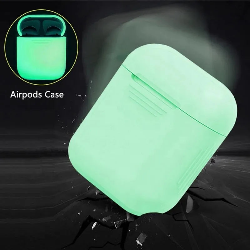 Glow-in-the-dark silicone flip-top protective case for Apple AirPods on a dark background