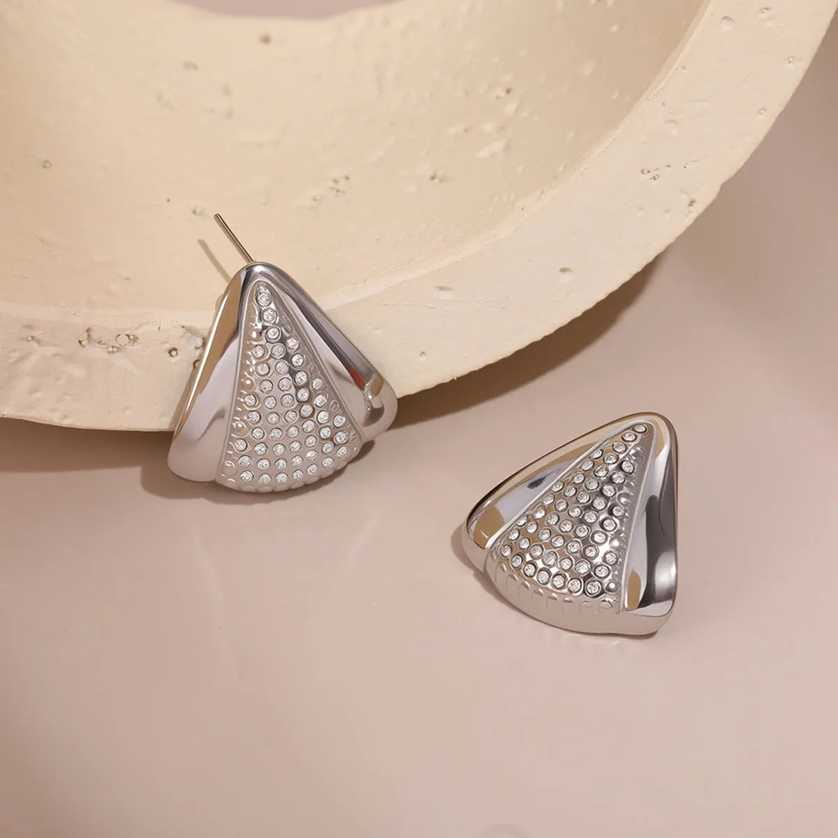 Geometric stainless steel stud earrings in triangle and curve shapes, electroplated 18K gold or steel colour