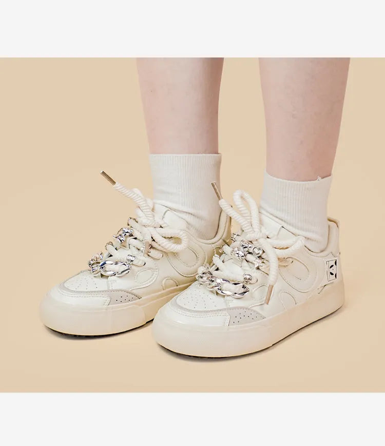 Casual white low-top lace-up sneakers for women with rubber sole and thick bottom heel