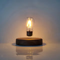 Magnetic levitation bulb night light floating above wooden base