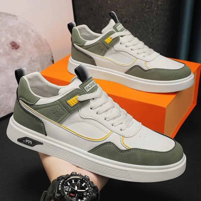Men's low-top canvas board shoes in grey with leather stitching and mesh lining visible at the collar.