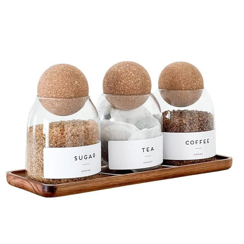 Set of three transparent spherical glass storage tanks with round single-layer design for general food storage