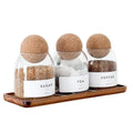 Set of three transparent spherical glass storage tanks with round single-layer design for general food storage