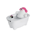 White USB desktop air humidifier with large water tank showing mist output.