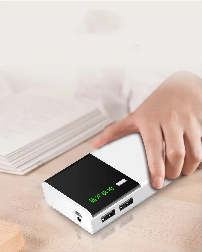 White large capacity mobile power bank with digital display and two USB ports on a clean background