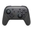 Black wireless Nintendo Switch controller with analogue sticks, face buttons, and LED indicators