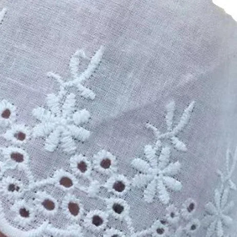 Cotton embroidered lace trim roll showing four different openwork pattern styles for DIY clothing