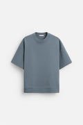 Loose double-sided texture polyester short sleeve top and matching shorts set on a hanger