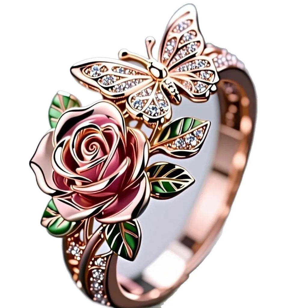 Close-up of an adjustable alloy butterfly ring with colourful oil-drip finish and floral details.