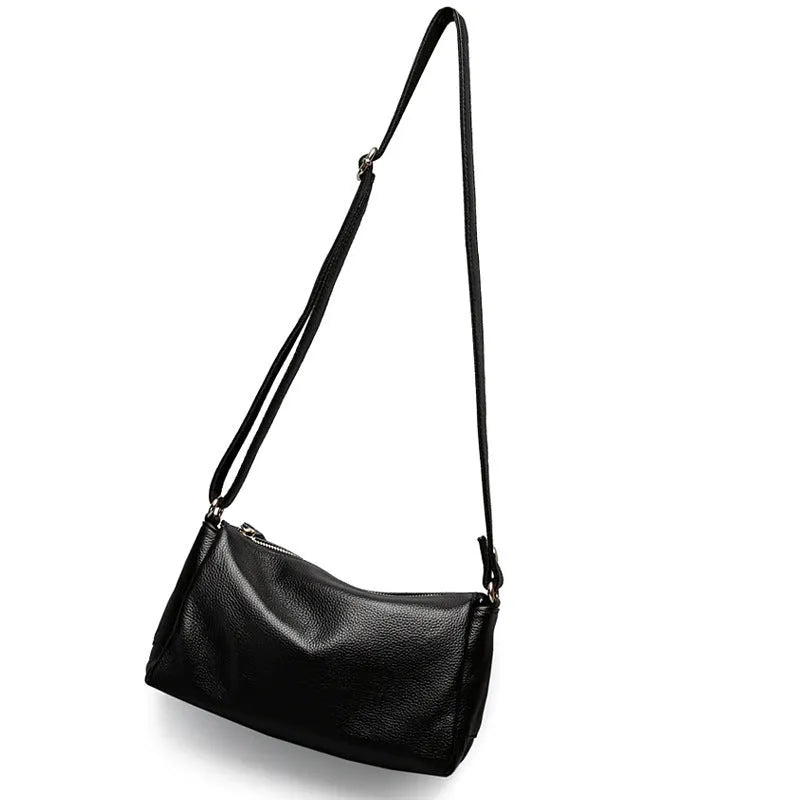 Soft genuine leather women's crossbody bag in horizontal square shape with an outer pocket.