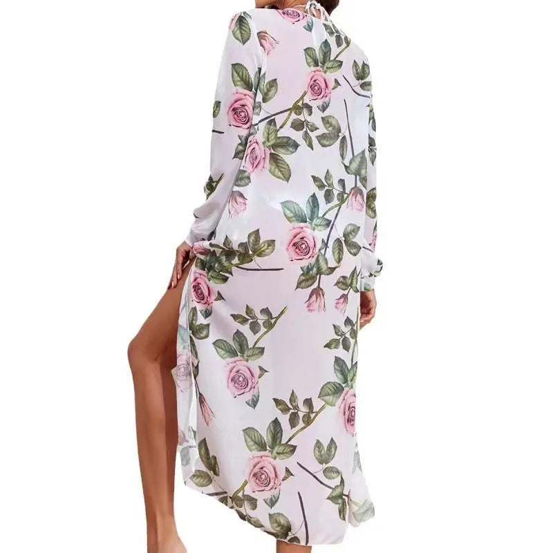 White printed three-piece women's swimsuit set with bikini, shorts and beach blouse