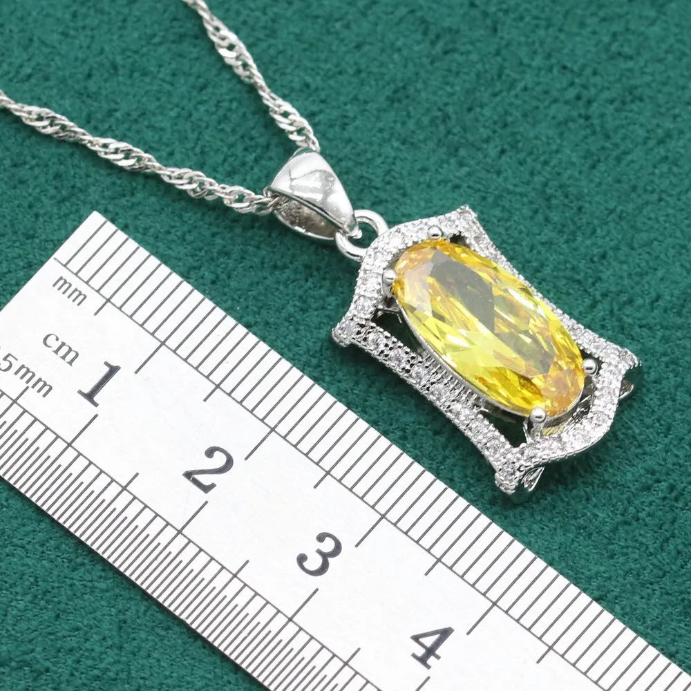 Anti-allergy alloy zircon jewellery set showing necklace, earrings, ring and bracelet in yellow or olive colours