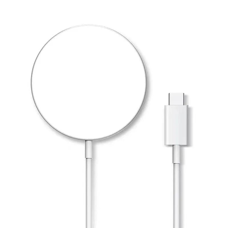 Round 15W magnetic wireless charger disc in white, black, and transparent finishes on a desk