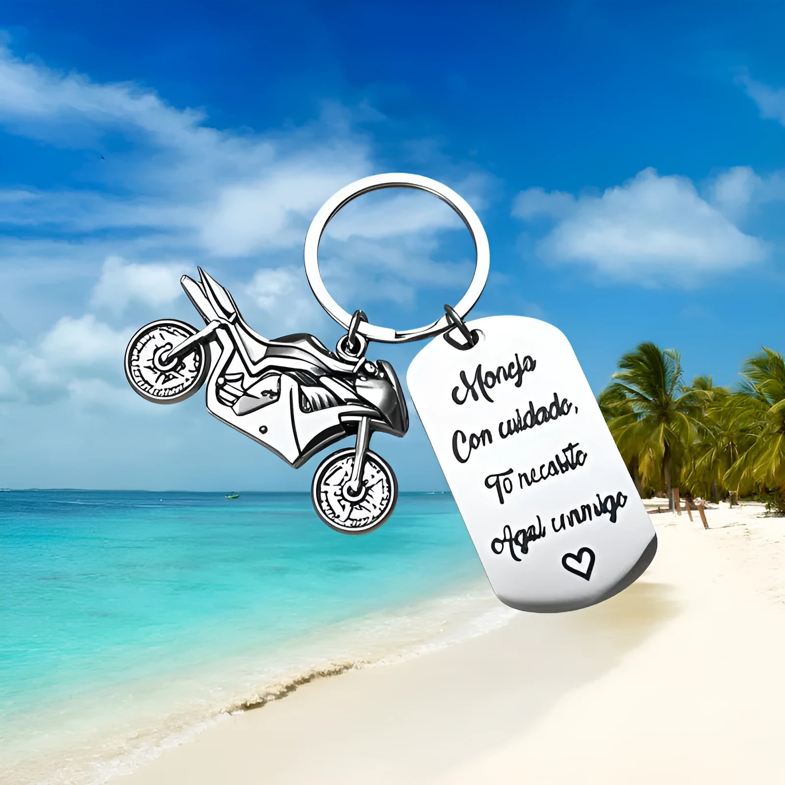 Stainless steel motorcycle keychain with minimalist design in a flannel gift bag.