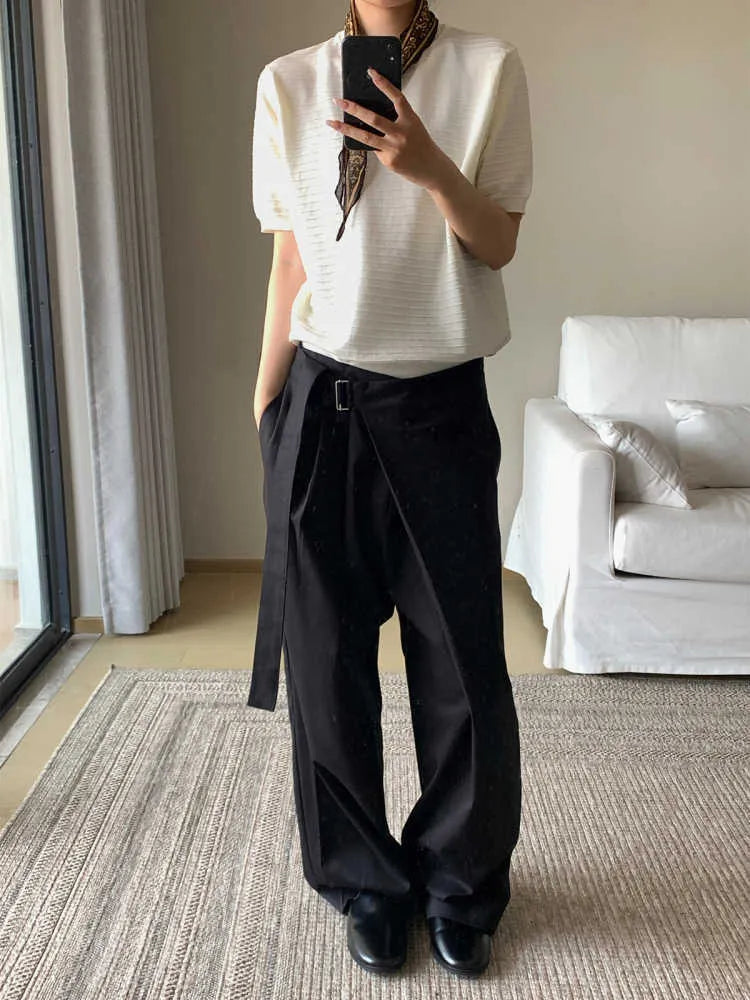 Black women's straight-leg trousers with a single pleat and adjustable waistband on a hanger.