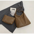 Women's large-capacity soft PVC shoulder bag bucket shape with stitching in beige white colour
