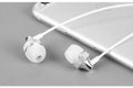 Gold metal in-ear headphones with a black wheat cable and 3.5mm plug on a white background.