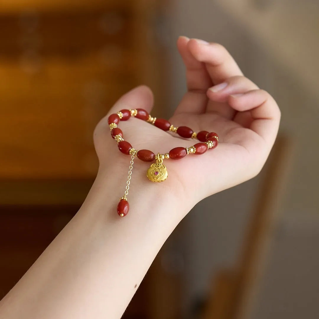 Natural red agate bracelet for women with handmade beads, geometric shape, and auspicious patterns in red agate fortune dumplings colour.