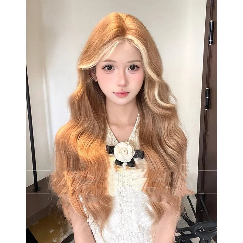 Long curly lace wig in American dyed gold colour showing full head coverage and natural hairline