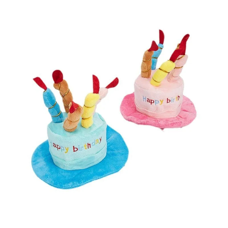 A blue or pink birthday hat for toy dogs on a white background.