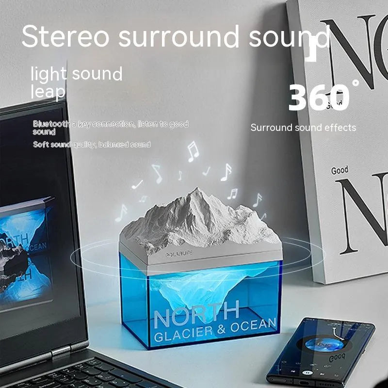 Glacier night light Bluetooth speaker with solid colour glacier pattern on bedside table