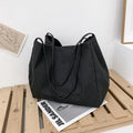 Solid colour women's canvas handbag with double shoulder straps and mobile phone compartment