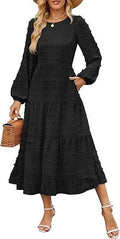 Women's beige long sleeve dress with ruffled sleeves and a high waist, shown on a hanger.
