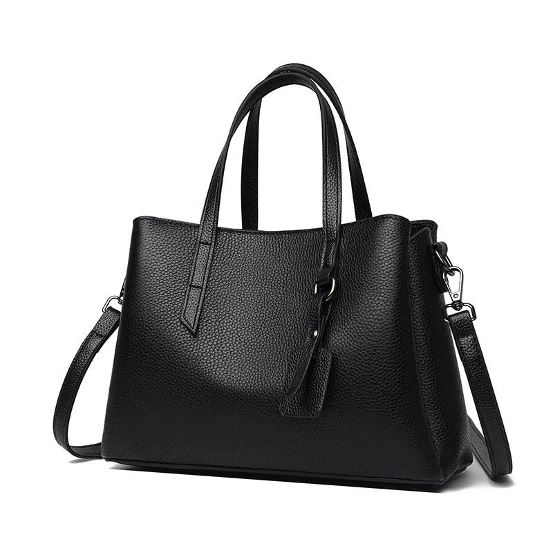 Genuine cowhide leather women's large capacity shoulder handbag in horizontal square shape with organiser pockets.
