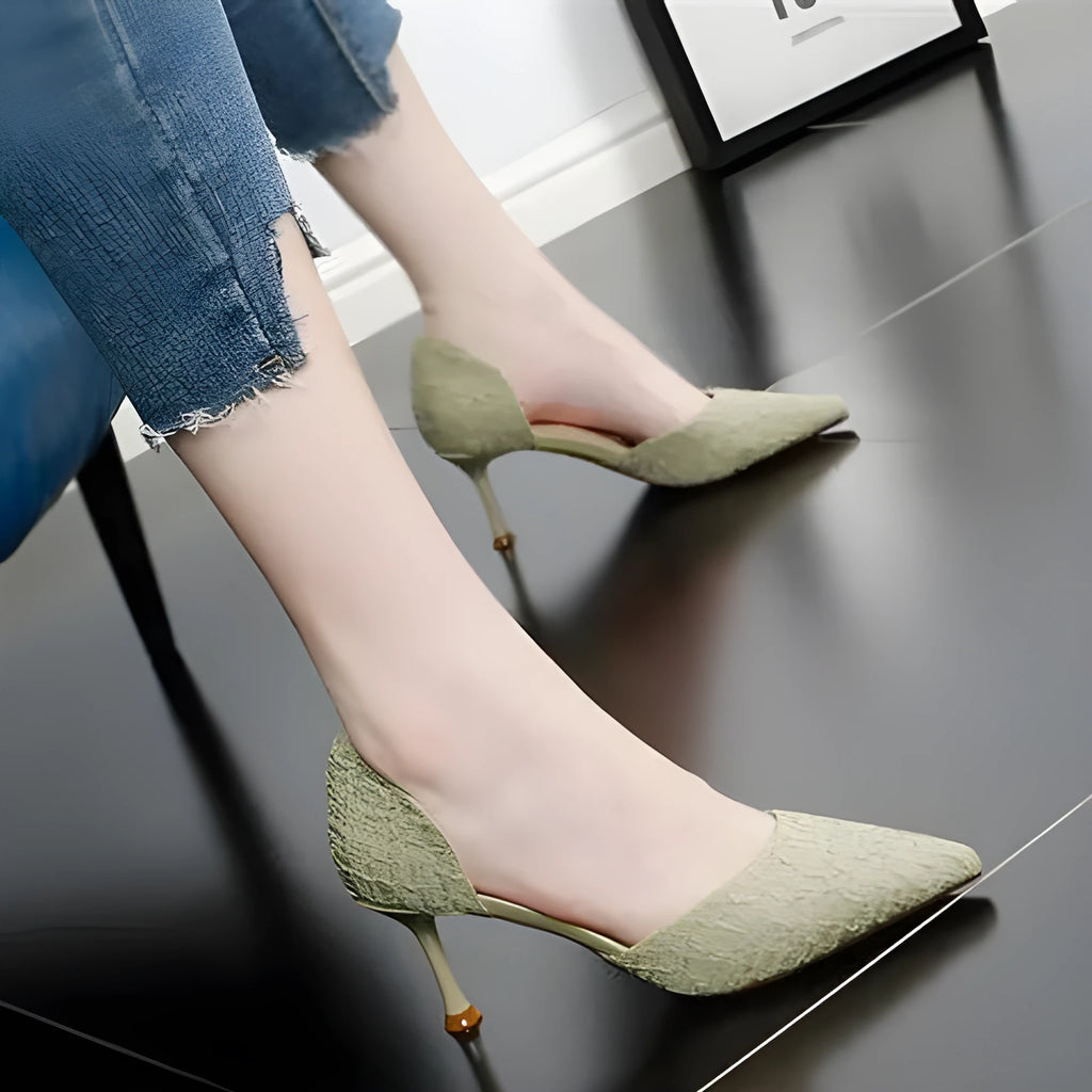 Women's black pointed-toe stiletto high heels with leather stitching details and 6-8cm heel