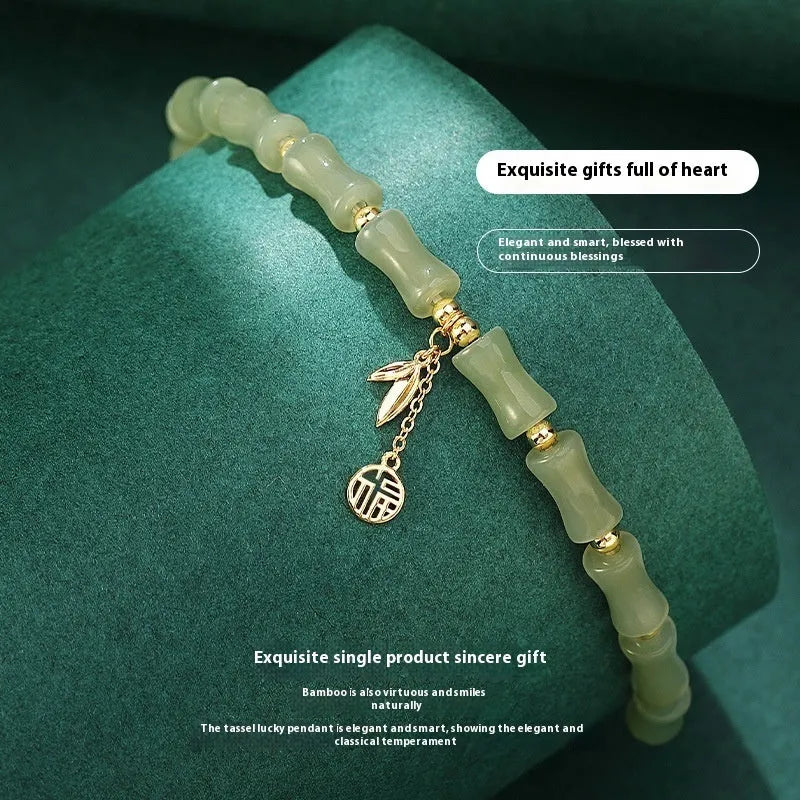 Chinese bamboo design jade bracelet and necklace set with green jade accents on alloy framework