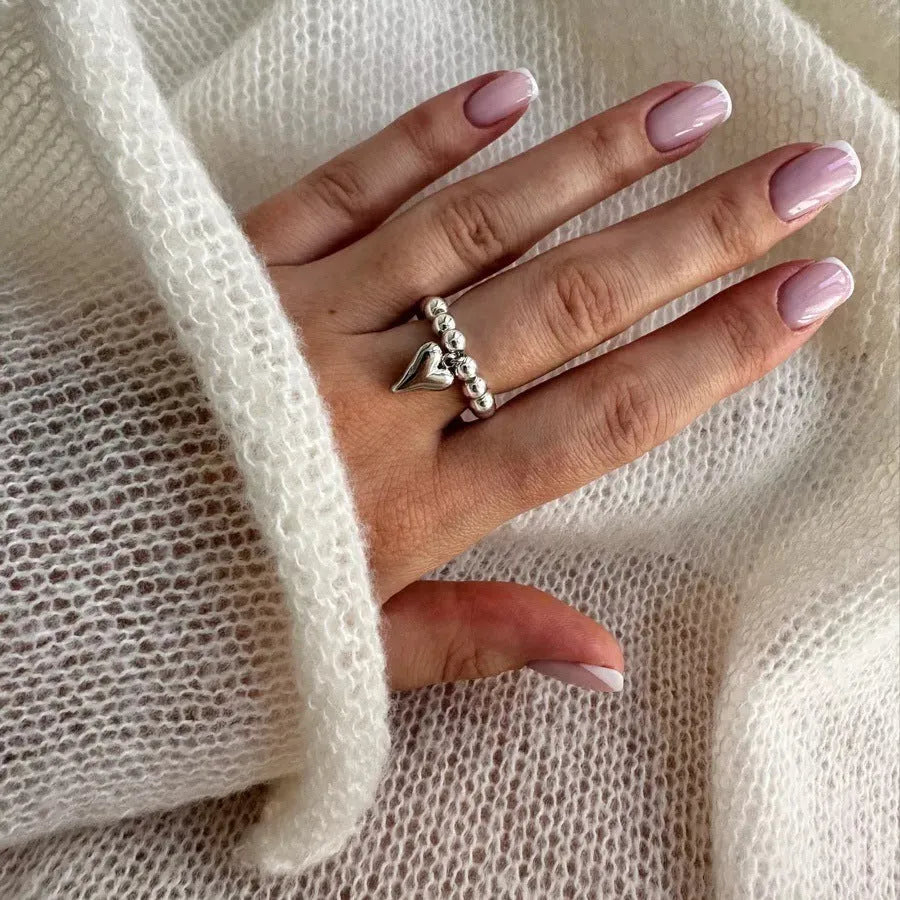 Handmade beaded elastic ring with geometric love heart design in gold or silver electroplated finish