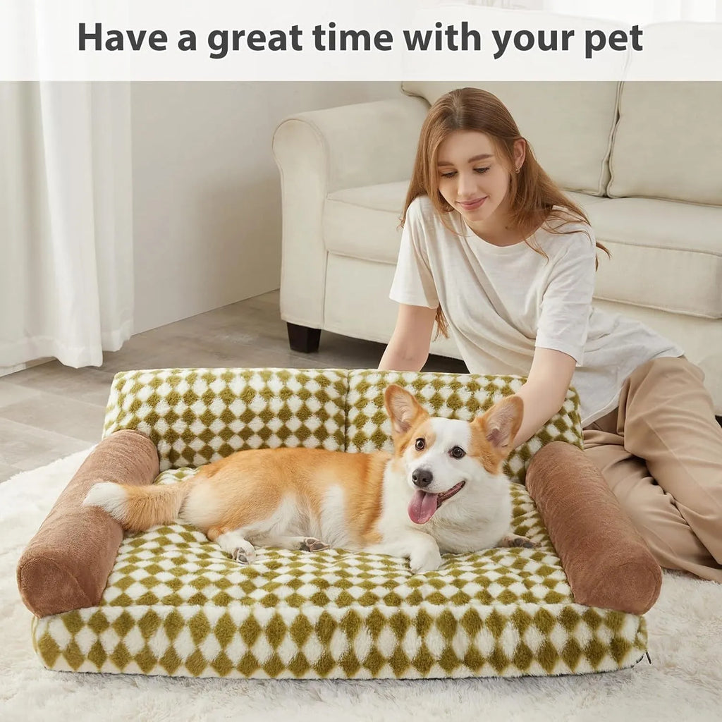 Checkered grey and white pet sofa bed for small dog or cat on wooden floor.