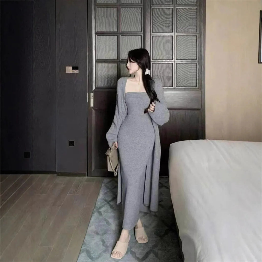 Women's grey knitted dress with matching cardigan coat, featuring regular sleeves and a long skirt.