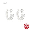 A pair of small round geometric stud earrings in sterling silver with an electroplated finish.
