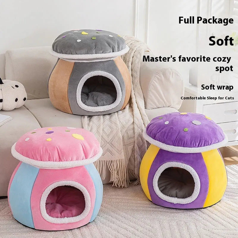 Grey mushroom-shaped plush cat bed with a detachable blanket inside, shown on a wooden floor.