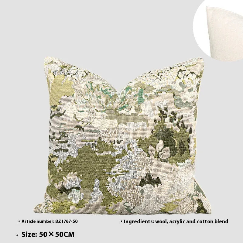 Antique green wool blend cushion with abstract spring flowers pattern in square and rectangular sizes.