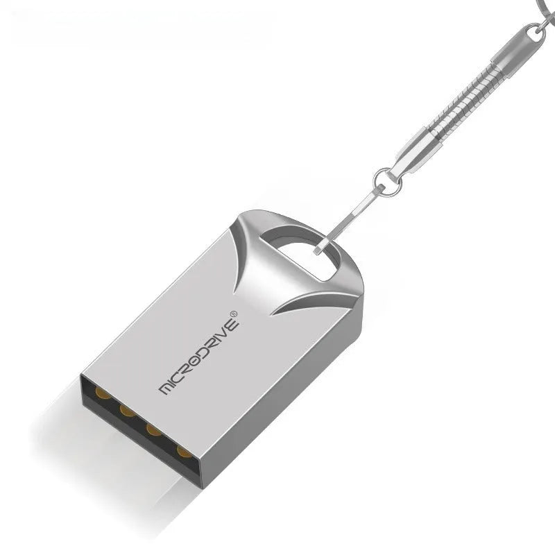 Small silver and black metal USB flash drive on a white background