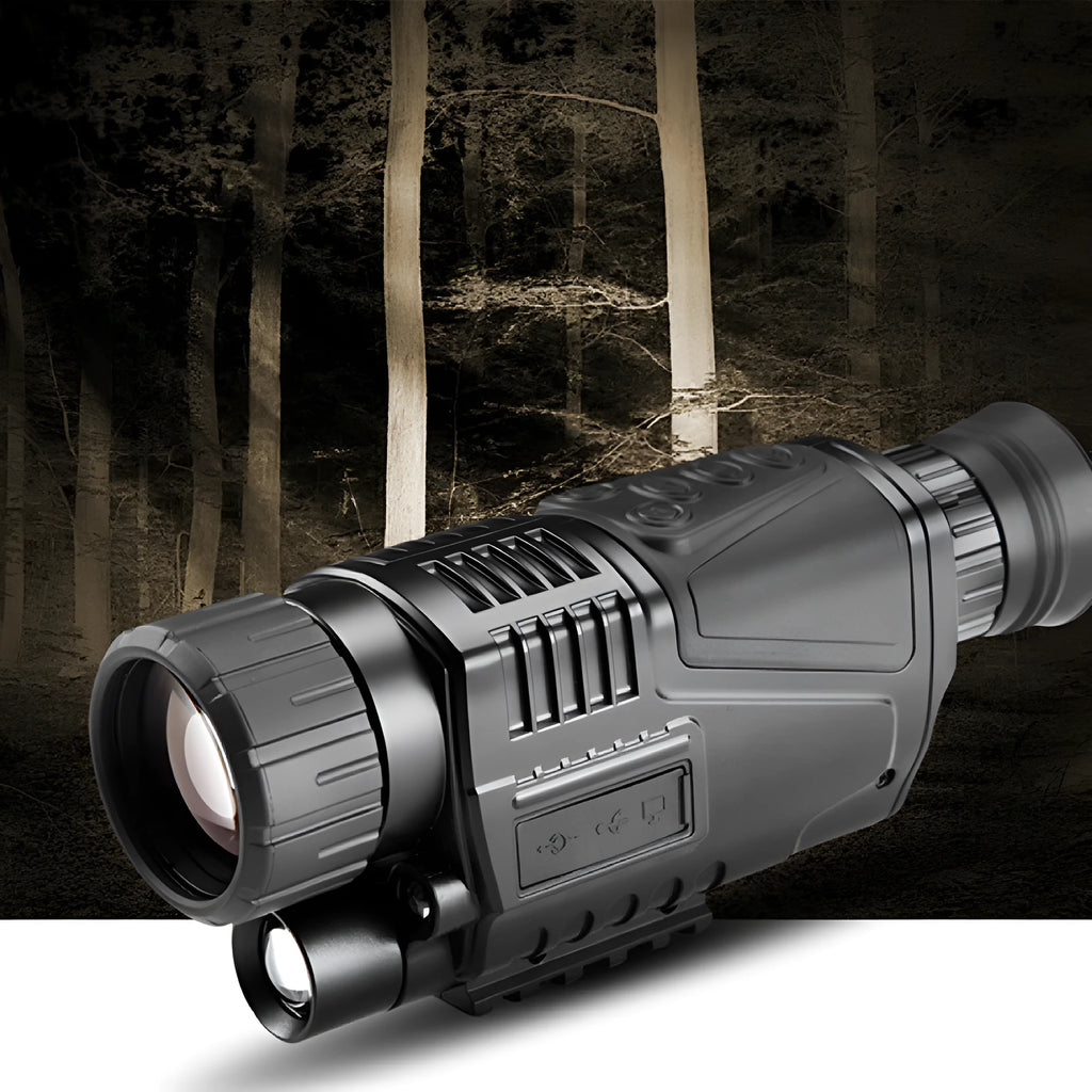 Black infrared digital night vision telescope with 40mm lens, rubber coating, and storage bag on a table.